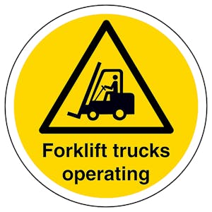 Fork Lift Trucks Operating Circular Labels On A Roll