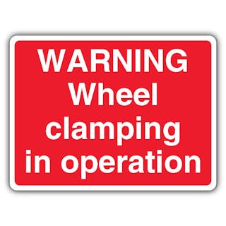 Warning Wheel Clamping In Operation - Landscape