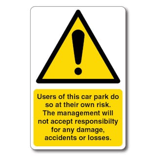 Users Of This Car Park Do So At Their Own Risk - Yellow Exclamation