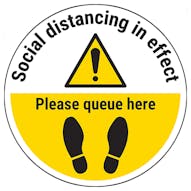 Social Distancing In Effect - Please Queue Here Temporary Floor Sticker