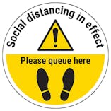 Social Distancing In Effect - Please Queue Here Temporary Floor Sticker