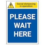 Social Distancing In Operation - Please Wait Here
