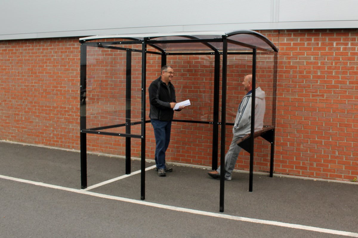 Curved Smoking Shelter with Integrated Seating