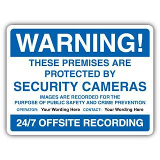 Warning! These Premises Are Protected By Security Cameras