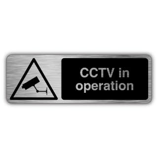 CCTV In Operation - Black CCTV Icon Triangle