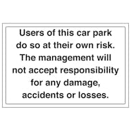 Users Of This Car Park Do So At Own Risk - Landscape